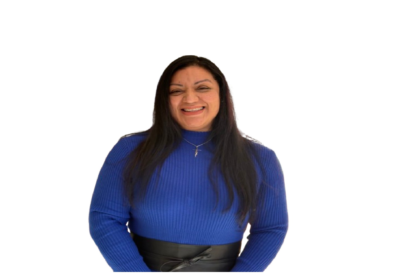 A woman with long dark hair, wearing a blue ribbed sweater and a necklace, stands smiling against a plain white background, representing the friendly professionalism of the CPA Team.